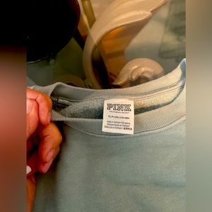 Crewneck sweatshirt runs large. Comfy. Size Small. Im usually Medium/Large